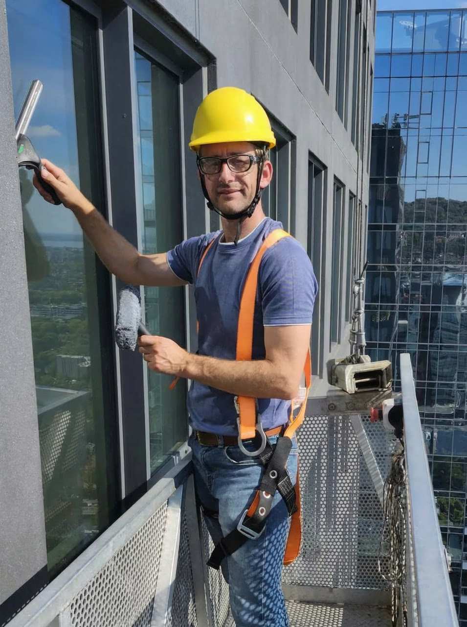 Professional during window cleaning